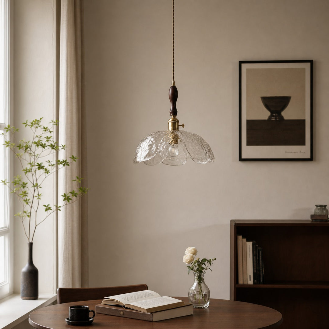 Clear walnut-accent pendant in a warm dining room