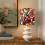 Bild in Gallery-Viewer laden, Colorful floral shade table lamp styled beside books
