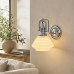 Bild in Gallery-Viewer laden, Creamy yellow glass wall sconce in sunlit lounge setting
