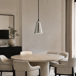 Load image into Gallery viewer, Tapered chrome pendant light above a contemporary dining table