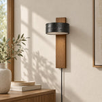 Load image into Gallery viewer, Walnut and black travertine wall sconce above a dining table