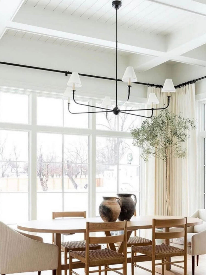 Sleek Chandelier Featuring Layered Linear Silhouette
