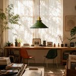 Cargar imagen en el visor de la Galería, Distressed green pendant lamp over a warm studio worktable
