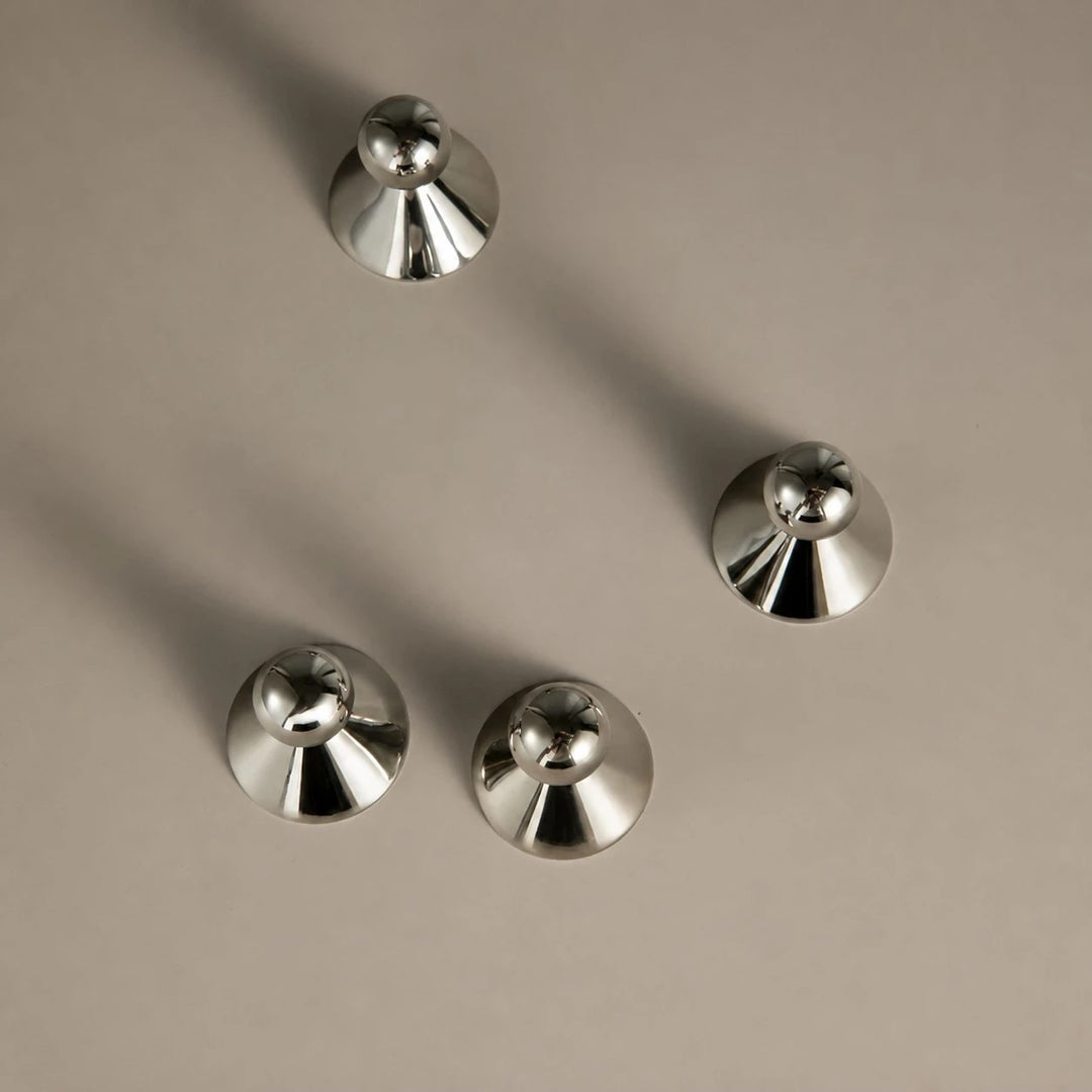 Top view of round cabinet knob bases and spherical grips