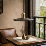Load image into Gallery viewer, Octagonal wood pendant light over a small cafe table