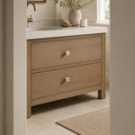 Cargar imagen en el visor de la Galería, Titanium silver knobs on a natural wood vanity