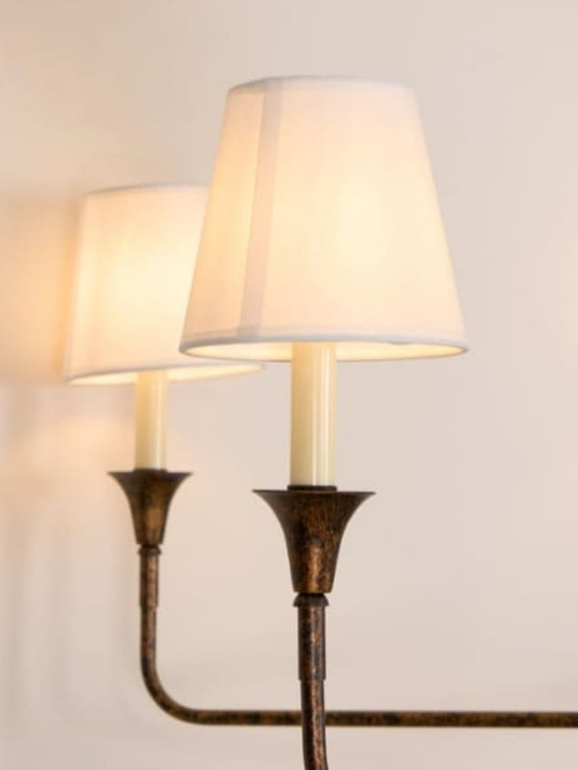 Sleek Chandelier Featuring Layered Linear Silhouette