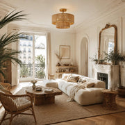 Rattan ceiling light in a bright sitting room