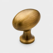 Small antique brass pigeon egg cabinet knob