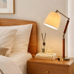Cargar imagen en el visor de la Galería, Adjustable wooden table lamp styled on a bedside nightstand