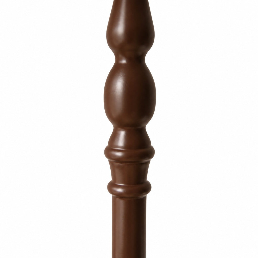 Lámpara de pie vintage con pantalla de tela y base de madera torneada