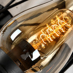 Cargar imagen en el visor de la Galería, Amber glass chimney shade and warm filament bulb detail