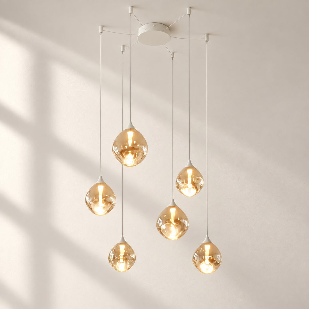 White six-light amber glass pendant, studio view