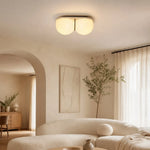 Cargar imagen en el visor de la Galería, Cream travertine ceiling lamp above a sofa