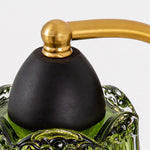 Bild in Gallery-Viewer laden, Brass-toned arm and dark lamp holder detail