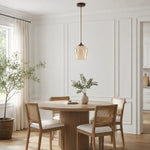 Bild in Gallery-Viewer laden, Amber glass pendant light above a dining table