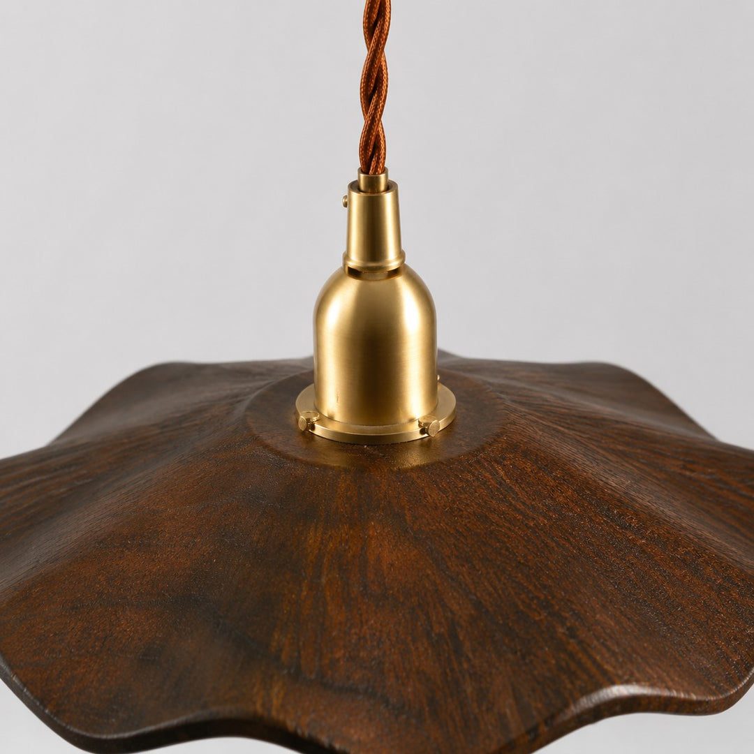 dark wood lotus pendant light brass socket detail