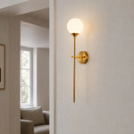 Cargar imagen en el visor de la Galería, Gold wall sconce installed beside a window