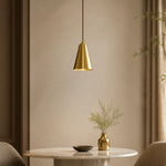 Load image into Gallery viewer, Tapered natural brass pendant light above a round dining table