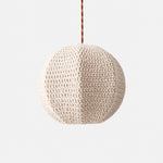 Charger l'image dans la visionneuse de galerie, Ivory 40 cm handwoven globe pendant light shown from an angled front view