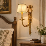 Bild in Gallery-Viewer laden, One-head brass and white wall sconce beside a classic bedroom setting