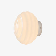 White ribbed glass wall sconce with chrome finish