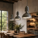 Cargar imagen en el visor de la Galería, Industrial cage pendant lights styled over a dining table