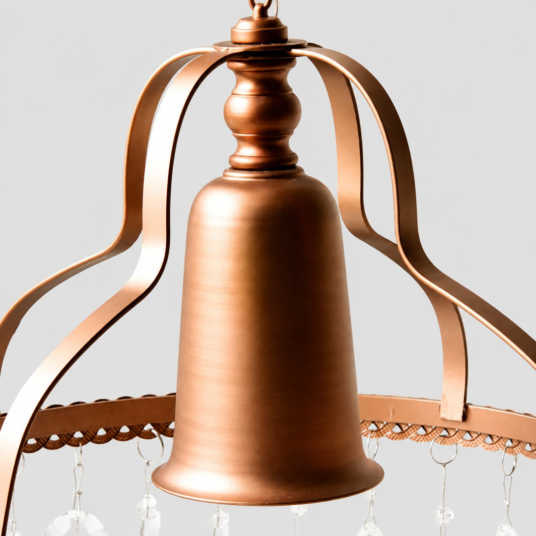 Close view of the copper-toned metal crown