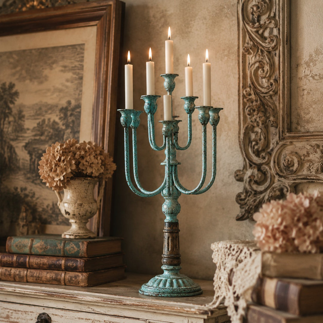 Blue-green branch candelabra styled on a mantel