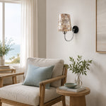 Bild in Gallery-Viewer laden, Capiz shell wall sconce beside a lounge chair and side table