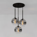 Cargar imagen en el visor de la Galería, Lámpara de araña minimalista de cristal Selvion: luminaria escultural de vidrio artesanal
