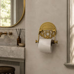 Load image into Gallery viewer, Antique brass toilet paper holder installed beside a bathroom vanity