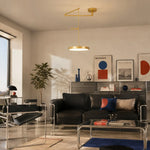 Load image into Gallery viewer, Gold movable pendant light in a Bauhaus-inspired living room