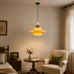 Bild in Gallery-Viewer laden, Caramel yellow glass pendant light in a quiet bedroom corner