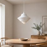 Load image into Gallery viewer, White glass pendant light in a bright dining room