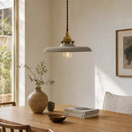 Load image into Gallery viewer, Distressed silver pendant light above a dining table