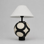 black and ivory ceramic globe table lamp with white fabric shade