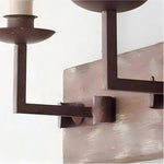 Cargar imagen en el visor de la Galería, Close view of the rustic dark metal candle arm and distressed wood backplate