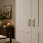 Load image into Gallery viewer, Cowhide leather and brass cabinet pull handle detail and lifestyle image