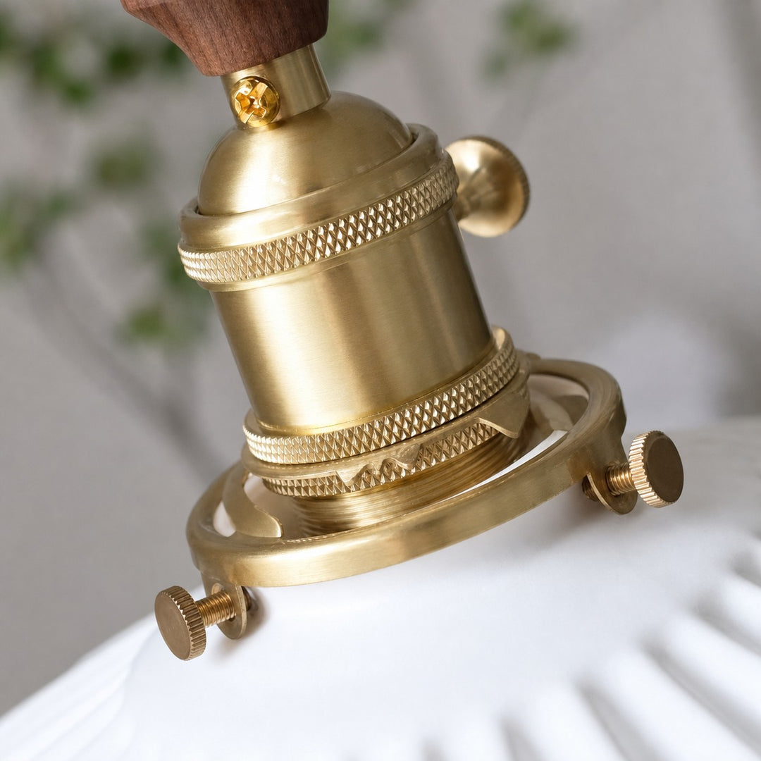 Close-up of brass-finish pendant lamp holder