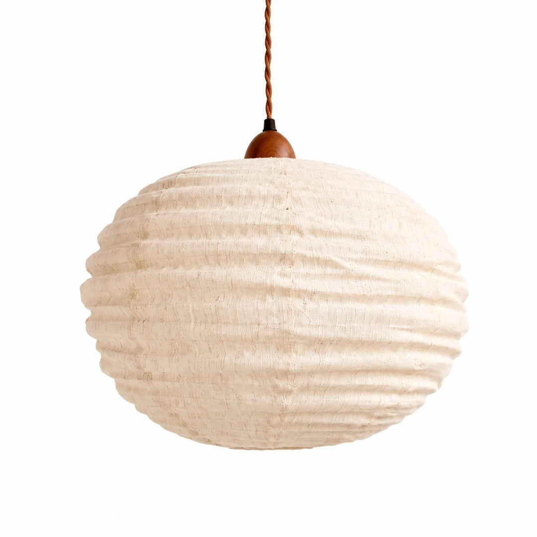 Off white cotton-linen round pendant light on a white background