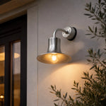 Charger l'image dans la visionneuse de galerie, Silver wall sconce installed over an entry sign