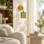 Cargar imagen en el visor de la Galería, Green hammered-glass sconce by a chair, lights off