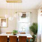 Load image into Gallery viewer, Lumivelle Sculptural 7-Light Chandelier – Adjustable Height Modern Glass Pendant
