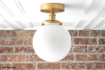 Bild in der Galerieansicht laden, Glorica Glass Mid Century Semi Flush Ceiling Light - White Opal Glass Globe Fixture
