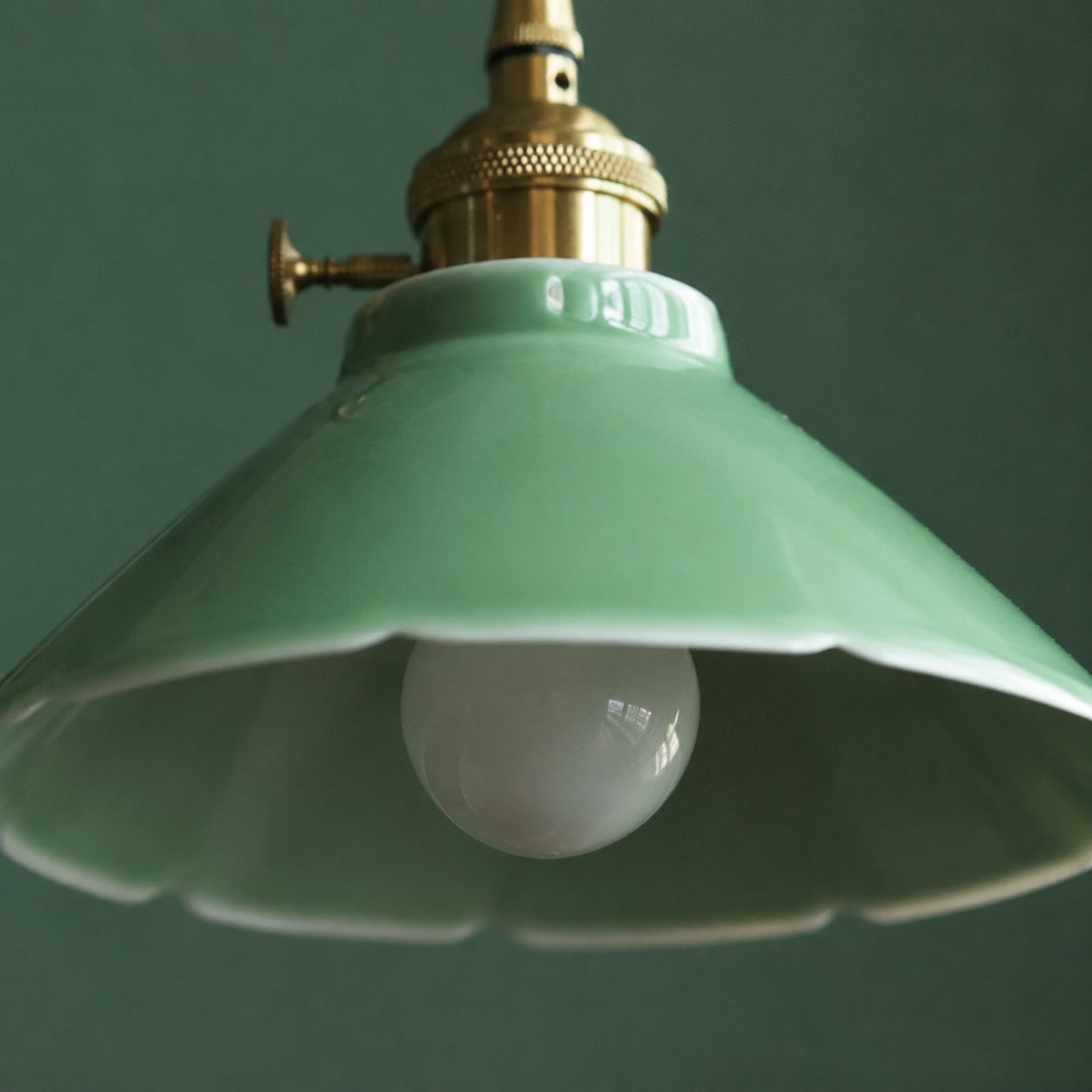 Green ceramic shade and bulb opening detail