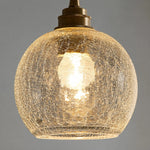 Load image into Gallery viewer, clear crackle glass shade glowing with warm light