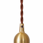 Load image into Gallery viewer, Close up of braided textile cord and brass tone lamp holder