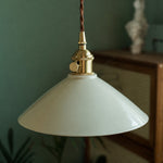 Bild in Gallery-Viewer laden, Brass-tone socket and ceramic shade detail