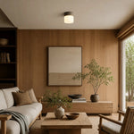 Cargar imagen en el visor de la Galería, Travertine flush mount light adding warm light to a compact lounge